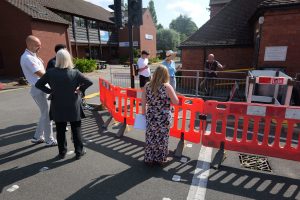 Group image of Cadent staff and the focus group talking next to roadworks